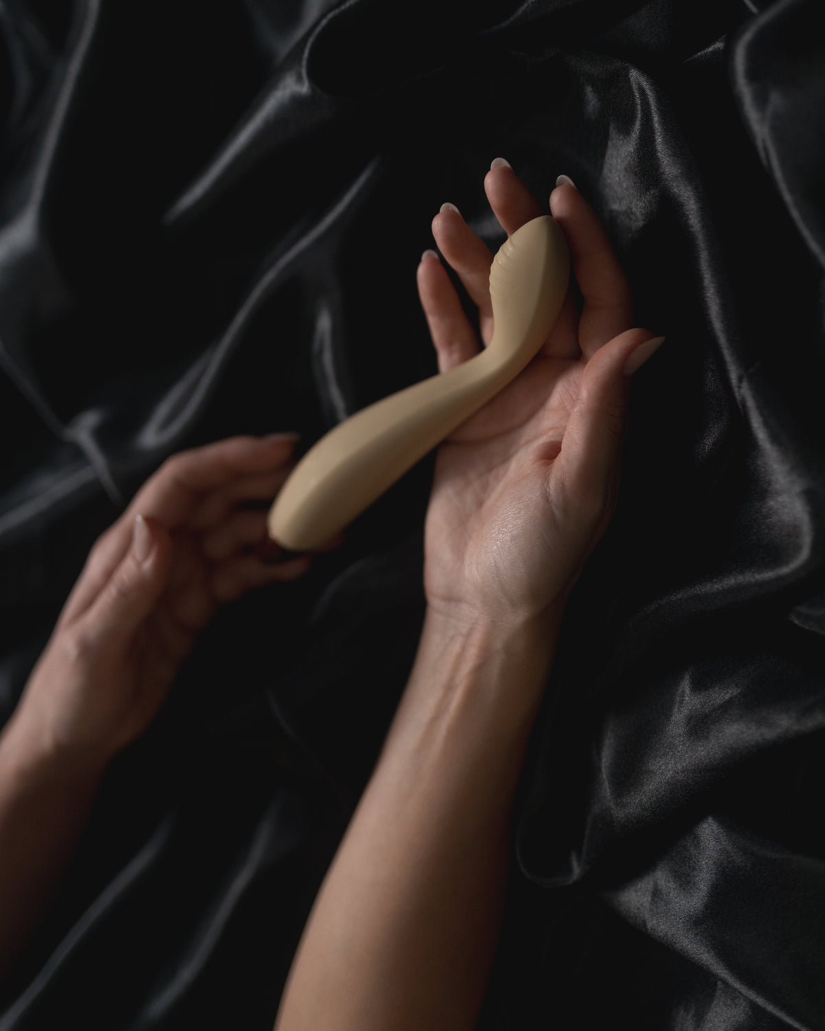 Eros curved vibrator by Black Pantera held in hands